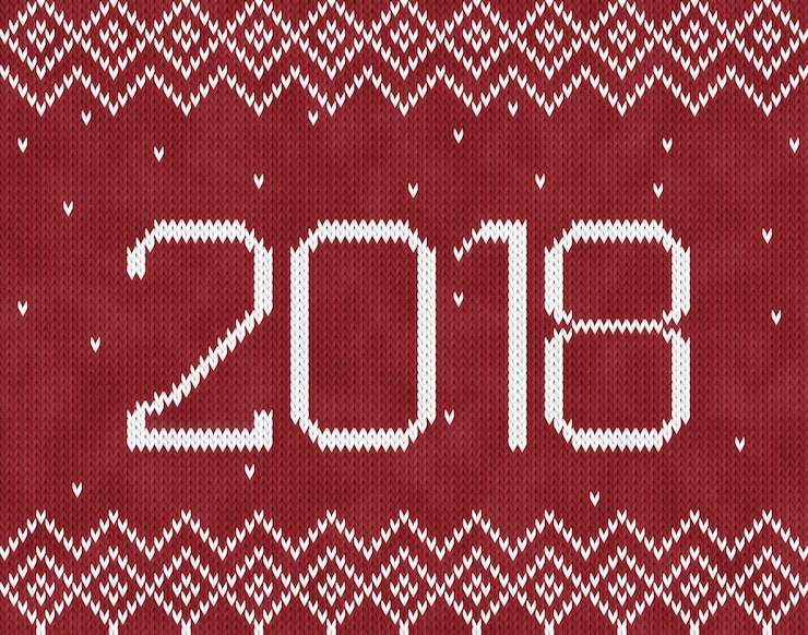 Photo close-up of 2018 number on red knitted textile