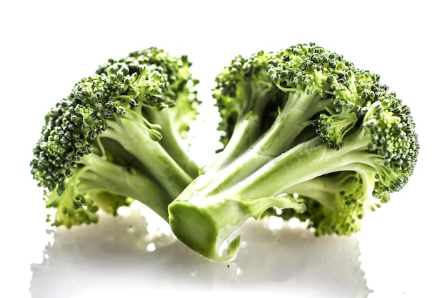 Close-up of broccoli over white background