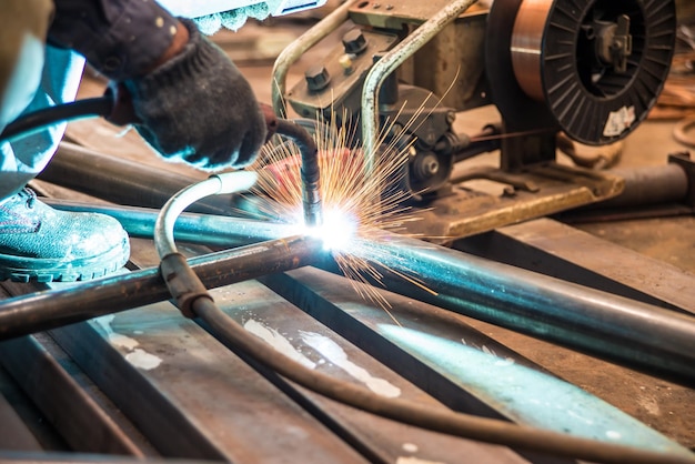 Close-up of man working in factory