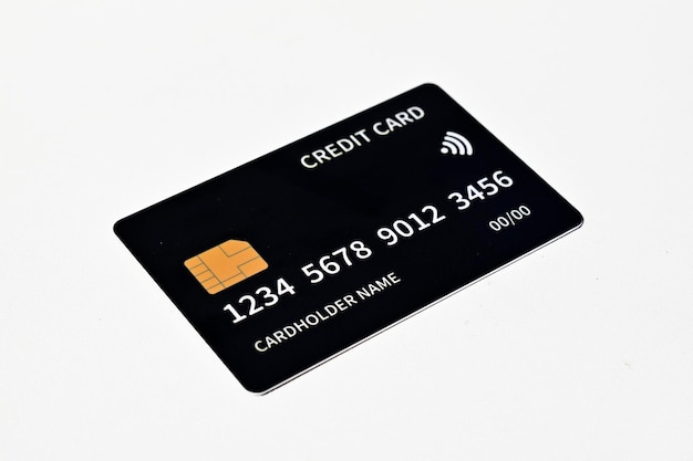 close up view of black credit card isolated on white background template mockup left view