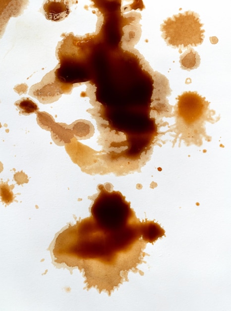 CloseUp di macchie di caffè e schizzi su sfondo di carta