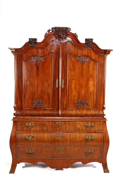 Closeup shot of a vintage chest of drawer commode isolated on white background