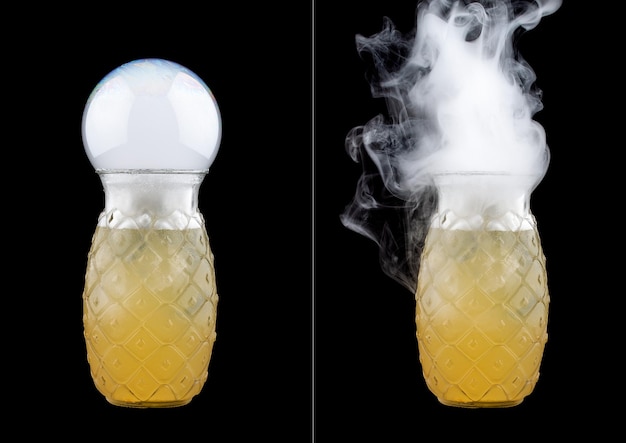 Cocktail di limone bolla di fumo su sfondo nero Prima e dopo lo scoppio della bolla Isolato