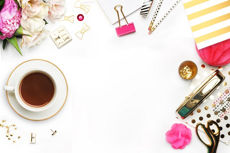 Coffee cup and items on the table. 