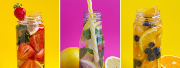 Collage di bevanda estiva Detox o acqua infusa con fragola, arancia, mirtillo e limone in bottiglia sullo sfondo colorato Primo piano