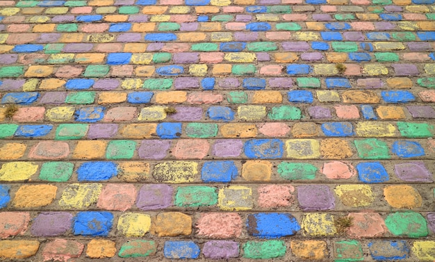 Colorato percorso di pavimentazione nel quartiere di La Boca a Buenos Aires, in Argentina per lo sfondo astratto