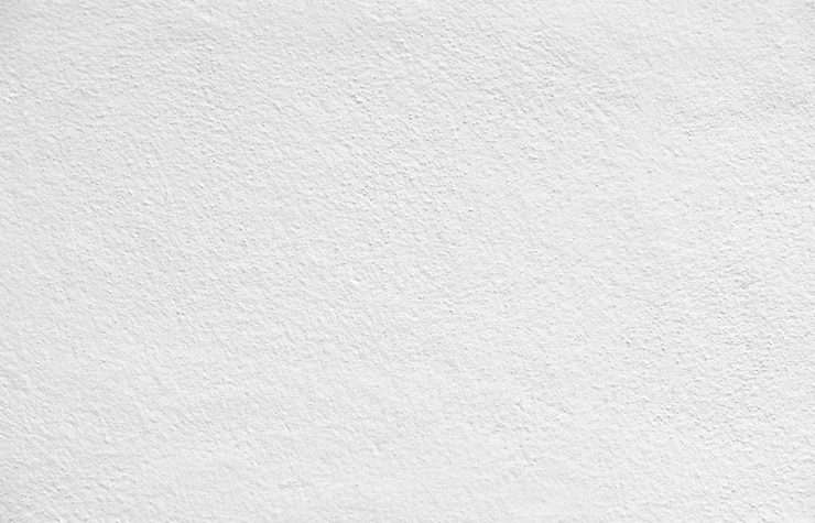 Foto colore bianco astratto della parete vuota e vuota del gesso concreto per il fondo di struttura