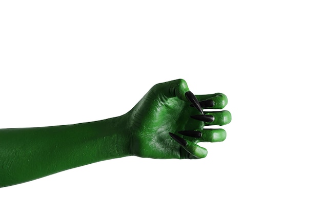 Colore verde di Halloween della mano del mostro delle streghe o di zombie isolata su fondo bianco