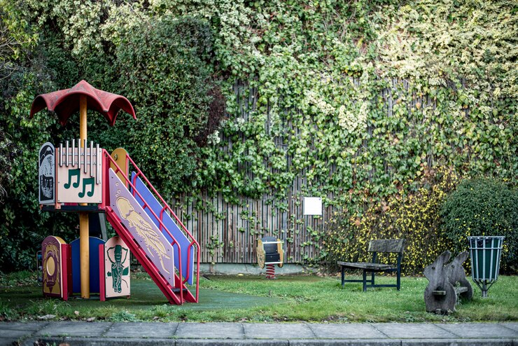 Photo colorful playground in park in sunny day