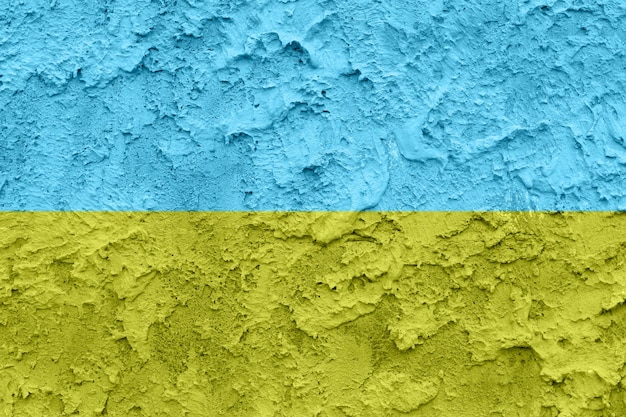 Colori blu e gialli della bandiera dell'Ucraina su struttura concreta