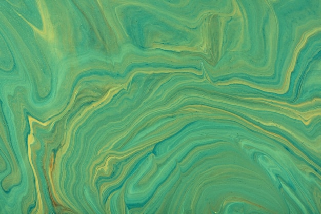 Colori verdi e gialli del fondo di arte fluida astratta. Marmo liquido. Dipinto acrilico con sfumatura verde oliva.