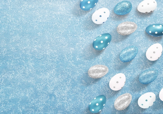 Composizione di molte uova d'argento, bianche e blu su struttura in cemento o su sfondo blu. Contenuti pubblicitari per le vacanze di Pasqua. Disposizione piatta, vista dall'alto, primo piano, copia spazio per il testo