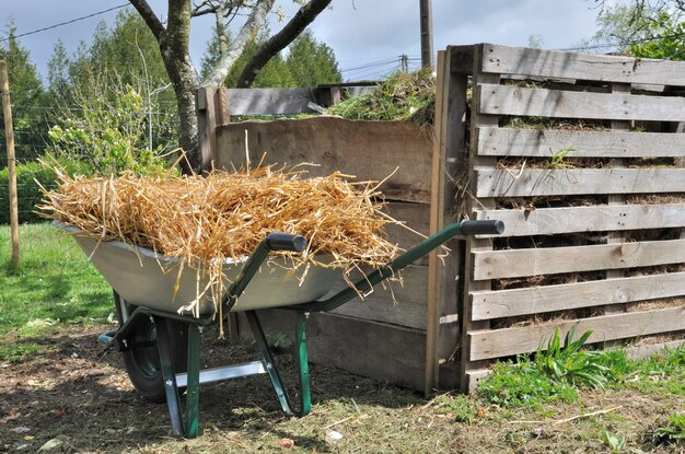 Composter e carriola