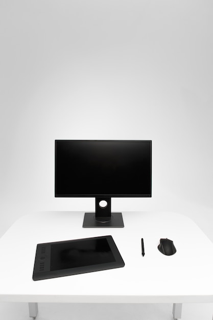 computer display on desk. desktop computer with photo retouching tools. modern creative photographer or designer workspace