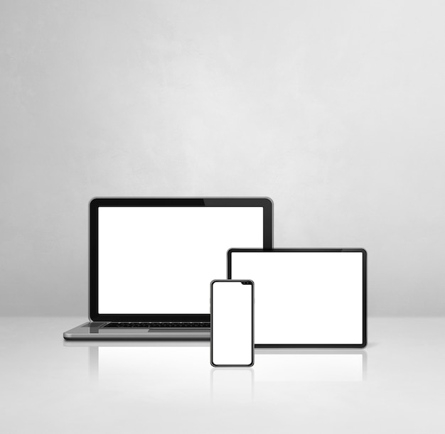 Computer portatile, telefono cellulare e tablet pc digitale sulla scrivania in cemento bianco. Illustrazione 3D