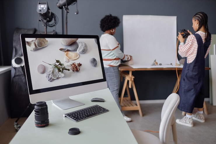 Photo computer with product photography pictures on screen
