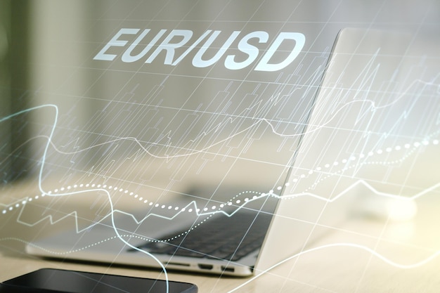 Concetto creativo dell'illustrazione del grafico finanziario EURO USD sullo sfondo di un computer portatile moderno Trading e concetto di valuta Esposizione multipla