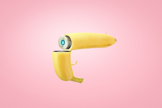 Concetto creativo di uno stile di vita sano. Una banana caricata con una cartuccia su uno sfondo rosa.