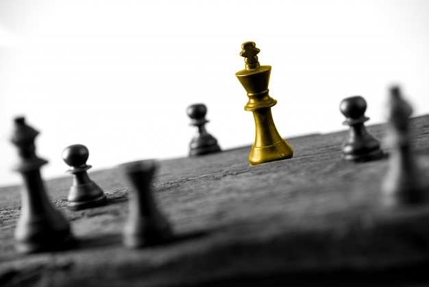 Concetto di business di scacchi, lavoro di squadra leader e successo