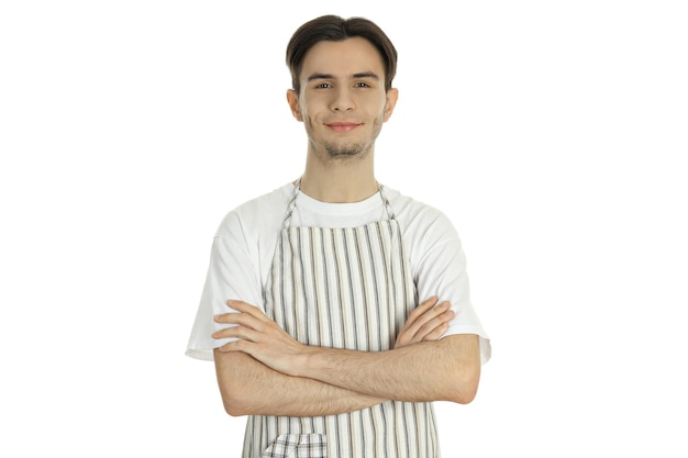 Concetto di cucinare con giovane uomo attraente isolato su sfondo bianco