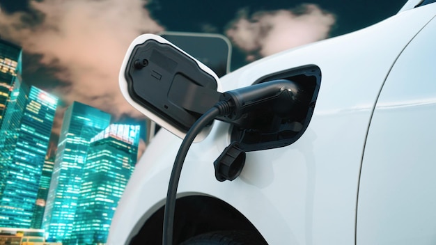 Concetto di energia pulita progressiva ecologica con auto elettrica con paesaggio urbano