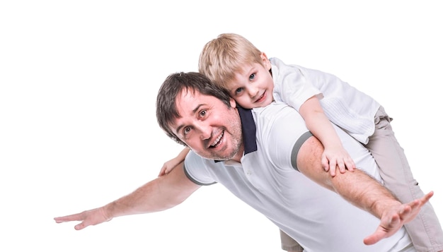 Concetto di felicità dei bambini padre felice che gioca con suo figlio di cinque anni