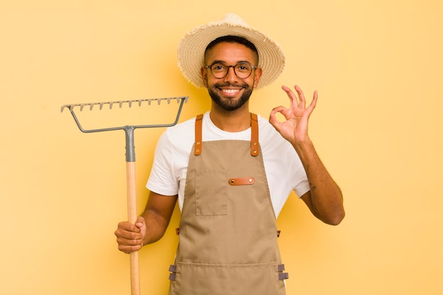 Concetto di giardiniere uomo afro nero