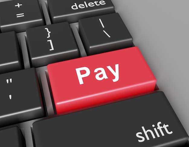 Concetto di paga. Word Pay sul pulsante della tastiera del computer