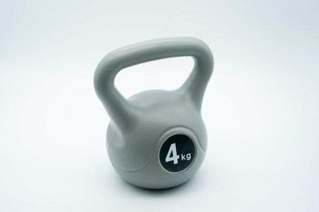 Concetto di palestra domestica con kettlebell e manubri