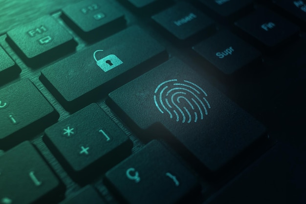 Concetto di tecnologia di sicurezza dell'impronta digitale sulla tastiera Protezione dei dati e sicurezza informatica