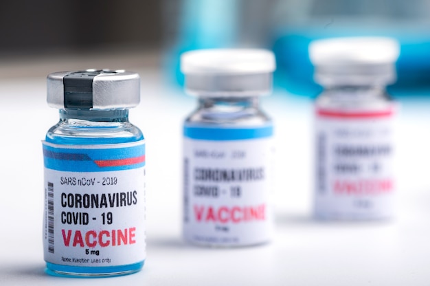 Concetto di vaccino contro il coronavirus covid19, ricerca medica o laboratorio scientifico, studio per la produzione di vaccini contro il virus per proteggere un coronavirus COVID-19