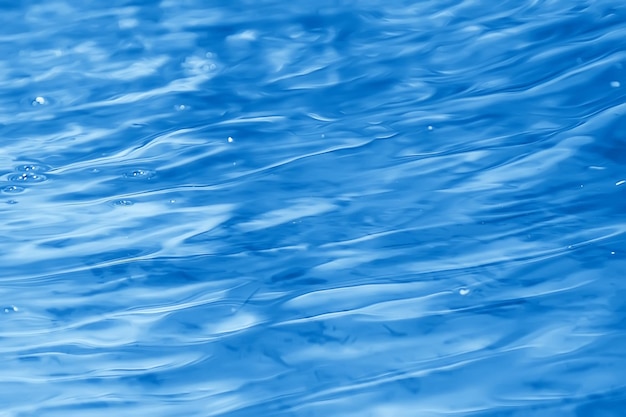 concetto sfondo astratto blu acqua / oceano, onde del lago sull'acqua, riflesso delle increspature sul fiume