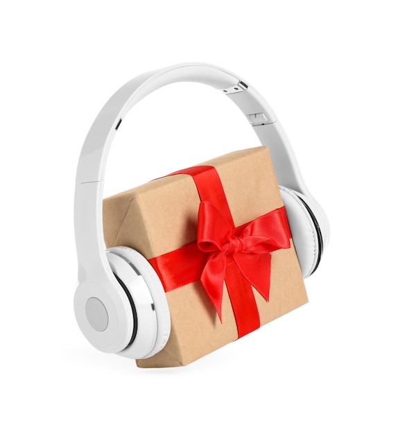 Confezione regalo con cuffie isolata on white Concetto di musica natalizia