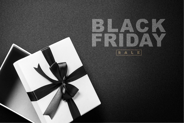 Confezione regalo con nastro nero e testo di vendita del Black Friday