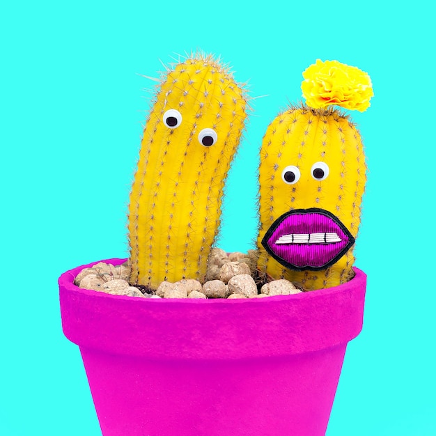 Coppia di cactus innamorati. Minimo concetto di moda divertente.
