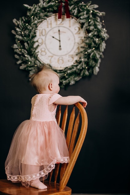 Corona dell'orologio delle decorazioni di natale della sedia della bambina