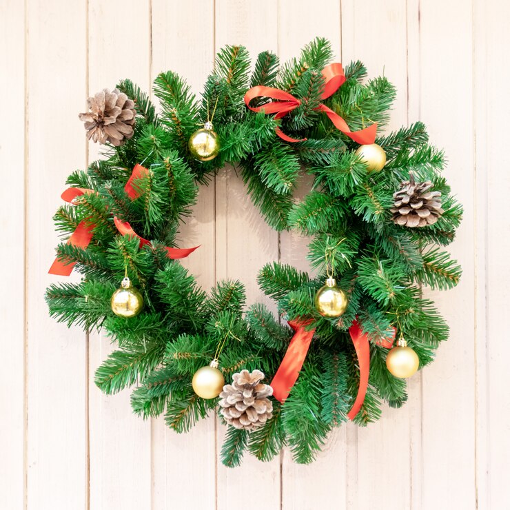 Foto corona di natale per decorazioni sulla porta. sfondo di natale, capodanno, vacanze invernali