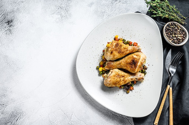 Cosce di pollo al forno con verdure