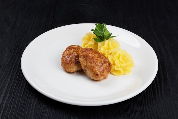 Cotoletta di pollo con purè di patate