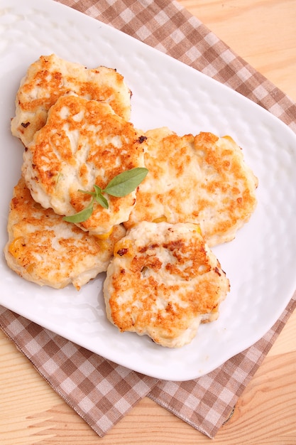 Cotolette di pollo con mais