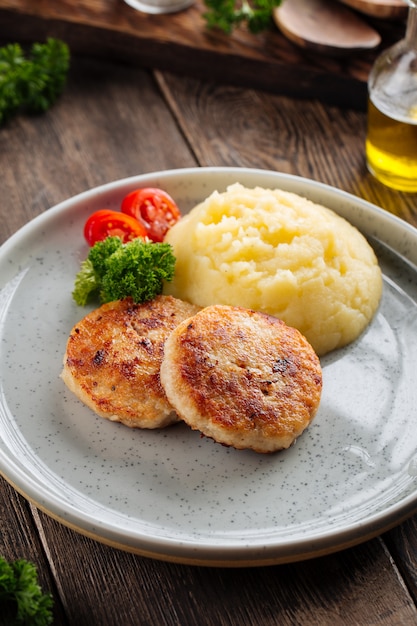 Cotolette di pollo con purè di patate