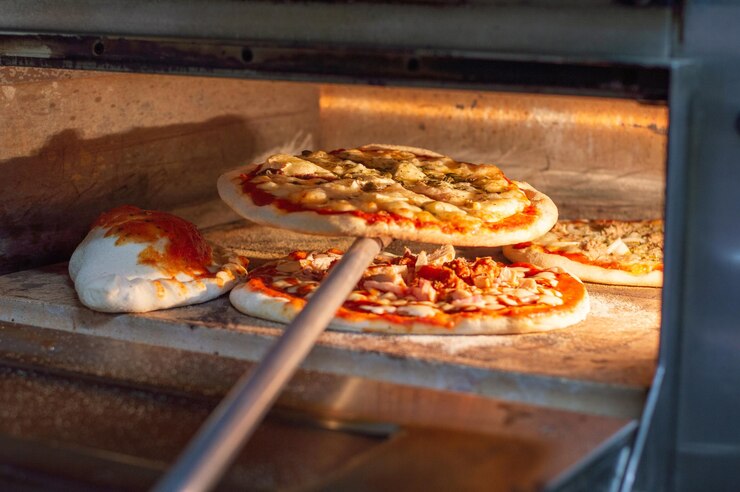 Foto cottura delle pizze
