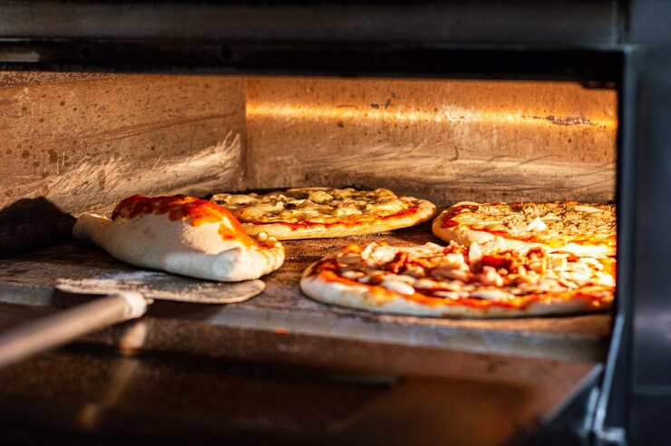 Foto cottura delle pizze