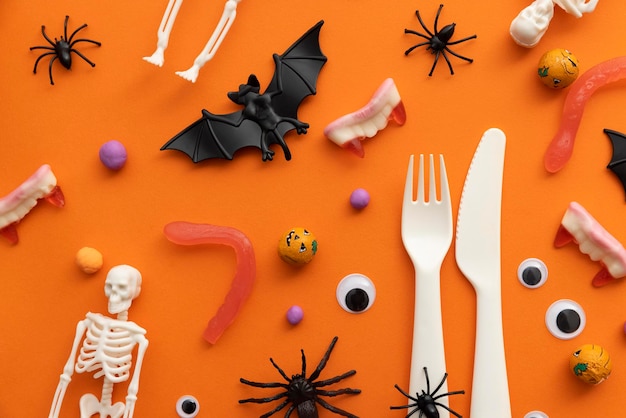 Cottura di sfondo per la cena di Halloween con decorazioni e dolci di Halloween