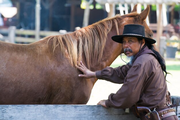 Cowboy con cavallo