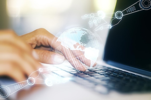 creative abstract robotics technology hologram with globe and hands typing on computer keyboard on background artificial intelligence and machine learning concept multi exposure