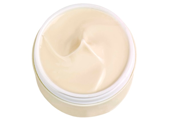 Crema cosmetica per il viso su sfondo bianco