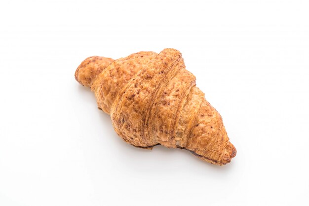 croissant di grano intero su sfondo bianco