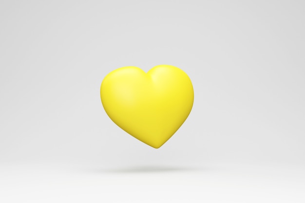 Cuore di amore giallo su sfondo grigio studio