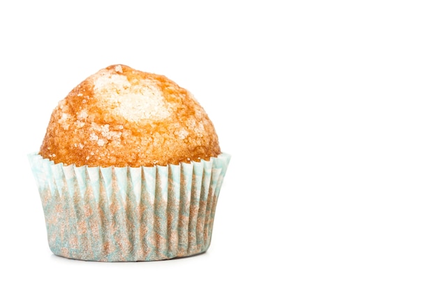 Cupcake vaniglia e zucchero su uno sfondo bianco